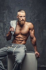 Wall Mural - Shirtless muscular guy with beard