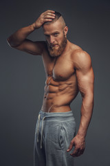 Poster - Shirtless muscular man with beard.