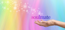 Seeking A Soulmate - Female Hand Palm Up With The Word Soulmate Floating Above, Surrounded By A Spiral Of Pastel Colored Soft Focus Love Hearts On A Bokeh Background