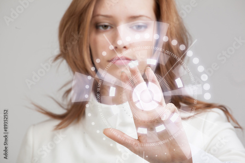 Fotografie, Obraz Future technology. Woman working with futuristic interface