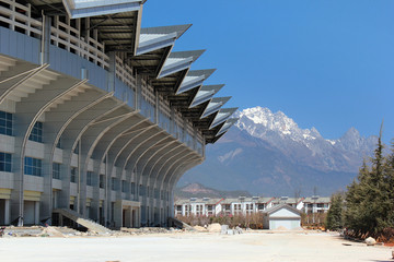 Building city stadium with beautiful mountain in the background,