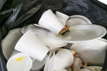 Environmental Unfriendly Disposed Styrofoam Plates And Cups In Garbage Bags
