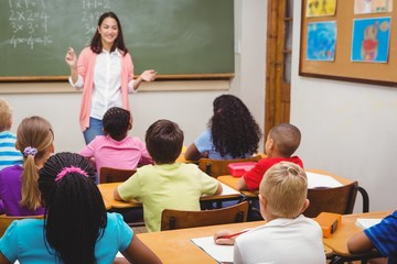 Teacher teaching her classroom of students