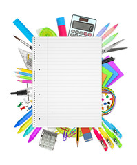 office / school supplies under spiral-bound notebook isolated on white background