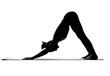 silhouette of woman practising yoga exercises