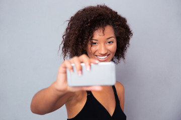 Sticker - Happy afro american woman making selfie photo