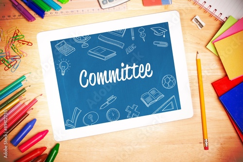 Fotografie, Obraz Committee against students desk with tablet pc
