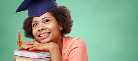 Canvas Print - happy african bachelor girl with books at school