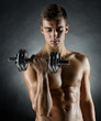 © Syda Productions - young man with dumbbell