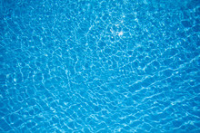 Blue Water Surface In Swimming Pool