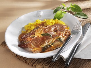 Wall Mural - Saltimbocca with saffron rice on plate