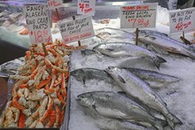 Salmon And King Prawns At The Pike Place Fish Market, Seattle, USA