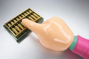 Plastic Hand with Miniature Abacus