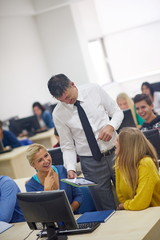 Canvas Print - students with teacher  in computer lab classrom