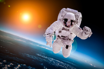 Wall Mural - astronaut in outer space