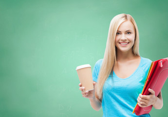 Canvas Print - smiling student girl with folders and coffee cup