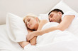 © Syda Productions - happy couple sleeping in bed at home