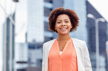 Poster - happy young african american businesswoman in city