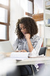 © Westend61 - Young fashion designer working in office