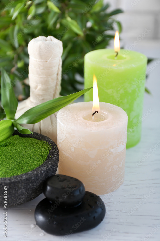 Beautiful composition of spa treatment on white wooden table