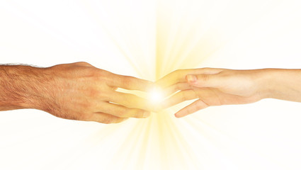 Wall Mural - Woman and man hand attracted to each other with light isolated on white