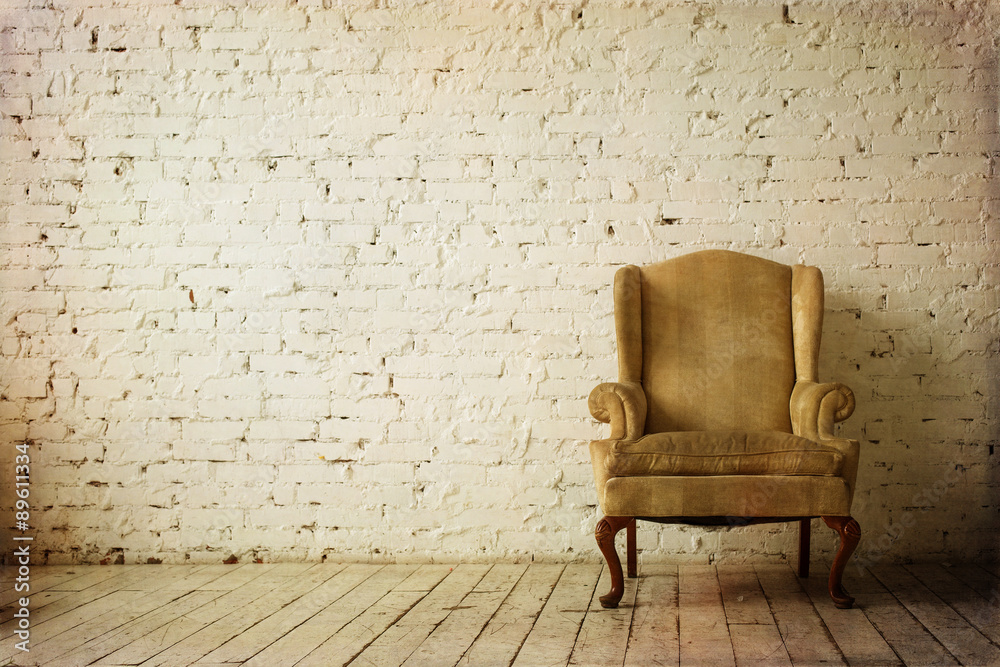 Old Retro Armchair against White Brick Wall Interior - obrazy, fototapety, plakaty 