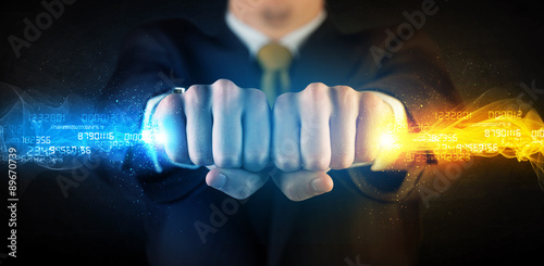 Fotografía Man holding colorful glowing data in his hands