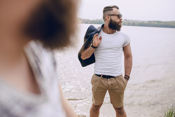 bearded man on the beach