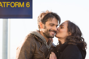 Kissing at train station