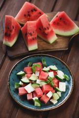 Wall Mural - Summer salad with watermelon, cucumber and sheep milk cheese