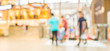 © coffmancmu - blurred image of shopping mall and people .