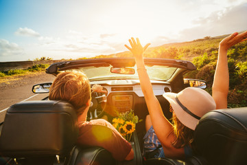 Wall Mural - Happy Couple Driving in Convertible