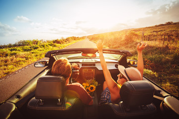 Wall Mural - Happy Couple Driving in Convertible