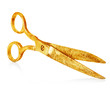 Vintage gold scissors close-up isolated on a white background