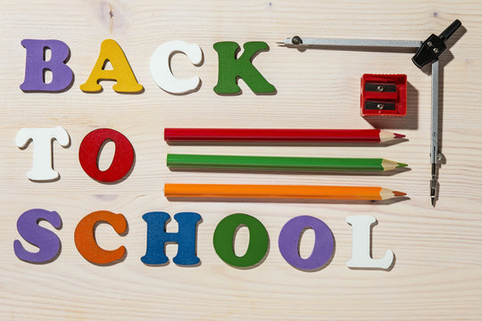 Wooden Colorful Letters Spelling Back To School With School Offi