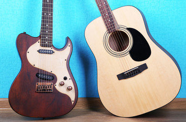 Wall Mural - Guitars on blue wallpaper background