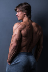 Wall Mural - Handsome man posing in studio