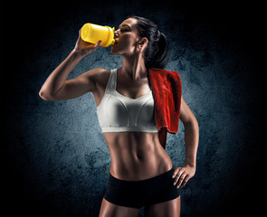 Wall Mural - attractive fitness woman, trained female body, lifestyle portrai