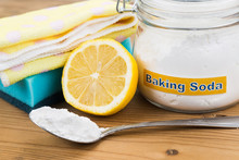 Baking Soda, Lemon With Sponge And Towel For Effective House Cleaning