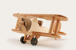 Handmade wooden toy plane with pilot