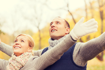 Poster - smiling couple in autumn park