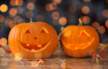 close up of carved halloween pumpkins on table