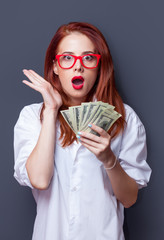 Poster - Portrait of a businesswomen in white shirt with money