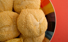 Close View Of Sesame Seed Bulky Rolls On A Plate