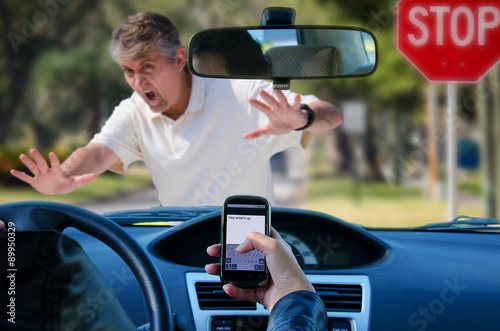 Fotografiet Irresponsible texting and driving wreck hitting pedestrian