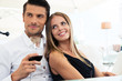 © Drobot Dean - Couple sitting in restaurant