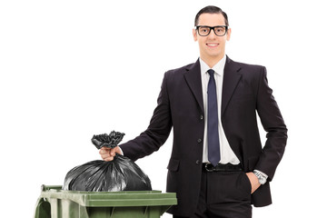 Poster - young businessman taking out the trash