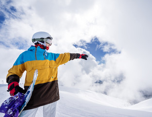 Snowboarder woman in mountains