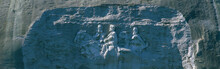 This Is The Confederate Civil War Memorial Carving At Stone Mountain Park Showing Jefferson, Davis, Robert E. Lee, And Stonewall Jackson. It Is Carved Into Granite Rock.