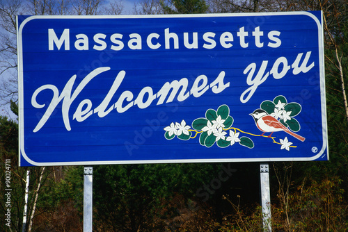 Fotografie, Obraz This is a road sign that says Massachusetts welcomes you
